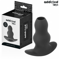 Addicted Toys Plug Creux L 11,1 cm seul sur fond blanc